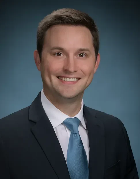 Dr. Andrew Mundy, orthopedic surgeon & sports medicine specialist at Synergy One Orthopedics in Sarasota, Florida